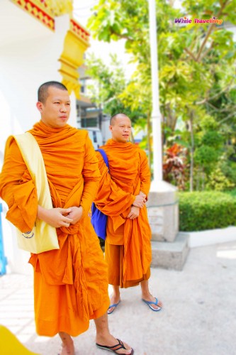 Monks at Wat Mahabut Temple in Bangkok
